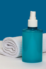 Spray bottle with towel