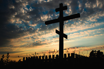 cross on a background sunset