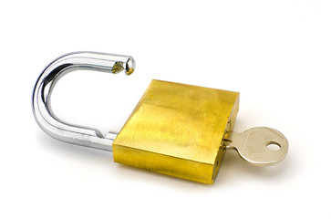 Unlocked padlock with the key on white background