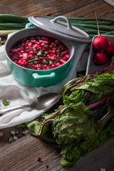 Beetroot soup with chives and radishes