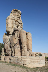 Fototapeta na wymiar colossi of memnon gigantic statues in Luxor Egypt