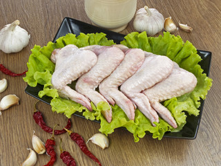 fresh chicken legs and spices