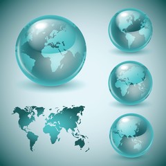 Set of shiny glass world globes