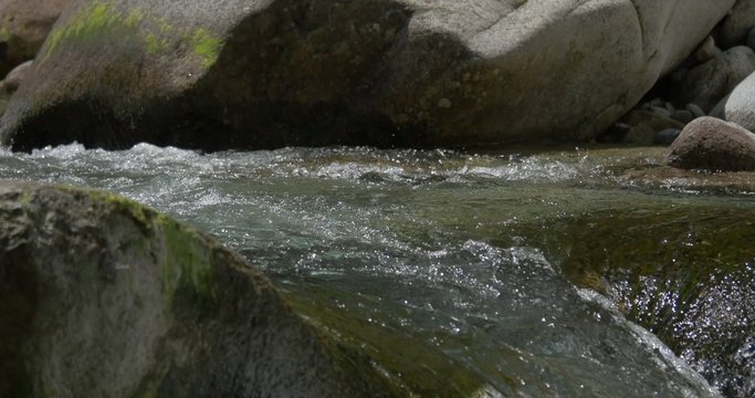 4K, abstract flowing and splashing water closeup