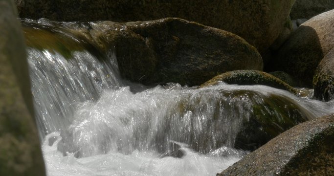 4K, abstract flowing and splashing water closeup