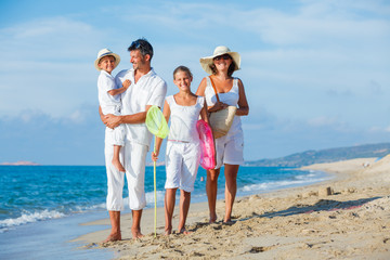 Family on tropical beach