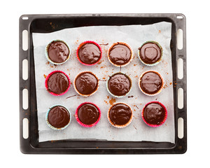 molten chocolate cakes on a baking tray