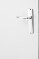 metallic door handle, white background