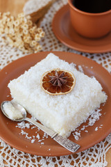 Sweet couscous (tapioca) pudding (cuscuz doce) with coconut