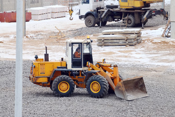 PERM, RUSSIA - NOV 25, 2014: Yellow tractor Amkodor. Amkodor - B