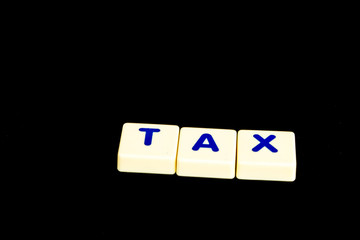 Financial concept,scrabble ,tax