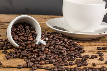 Coffee bean on grunge wooden background