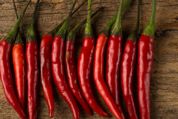 some chili peppers on wood table