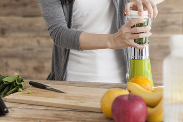 Women are making a vegetable juice for health