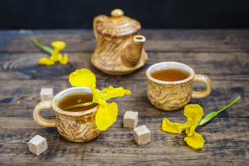 Obraz na płótnie Canvas tea, teapot and flowers