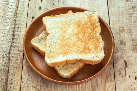 Toast in wood dish