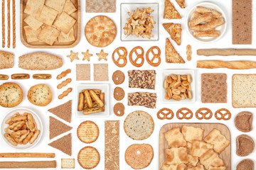 crackers and snacks on white background