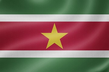 Suriname flag on the fabric texture background