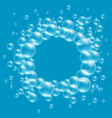 Transparent soap bubbles like frame on blue background