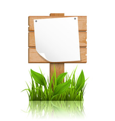 Wooden signpost with grass deflected paper and reflection on whi