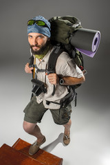 Portrait of a male fully equipped tourist 
