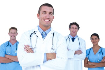 Fototapeta premium Smiling doctors and nurses standing