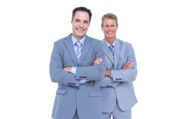  Business team standing arms crossed