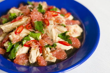 Salad with chicken breast, grapefruit, lime and chili 