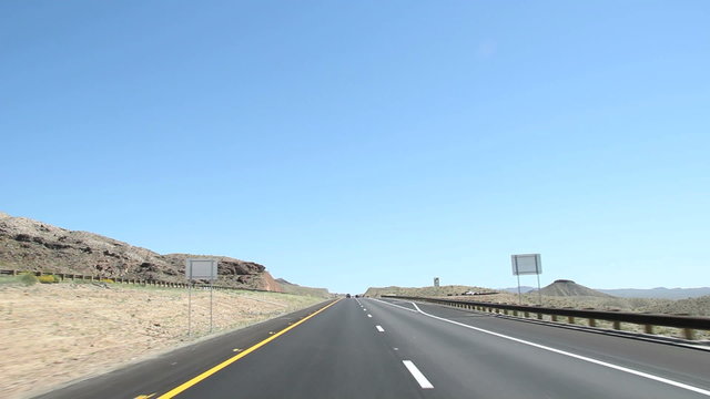 Nevada interstate highway drive timelapse, few cars on the road on a sunny day