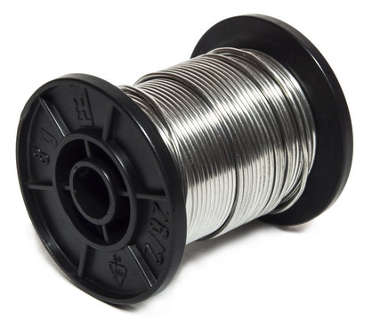 Tin spool on white background.