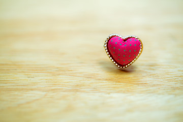 Valentine day background. Heart on wood board.