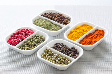 Colorful herbs,spices and aromatic ingredients on modern table.