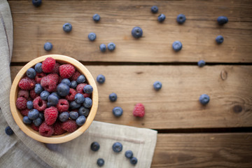 nice fresh berries on wooden background