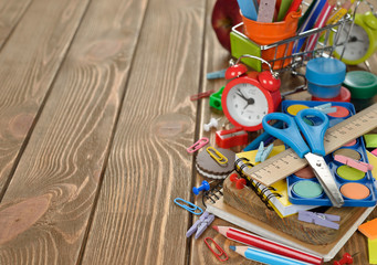 Fototapeta na wymiar Multicolored children's school supplies