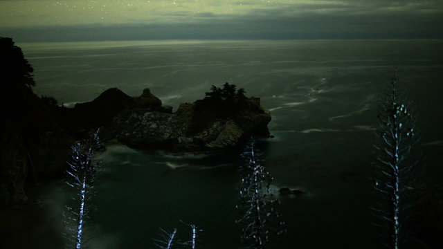  Motion controlled dolly astrophotography time lapse footage with zoom in motion of Mc Way Falls at night in Julia Pfeiffer Burns State Park, Big Sur, California