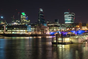 Fototapeta na wymiar Skyscrapers at night, London city