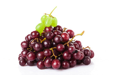 Black and white grapes isolated on white background