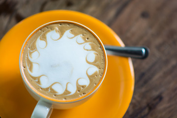 Yellow cup of coffee