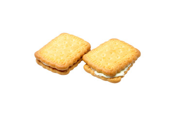 Biscuits with butter cream over white background.