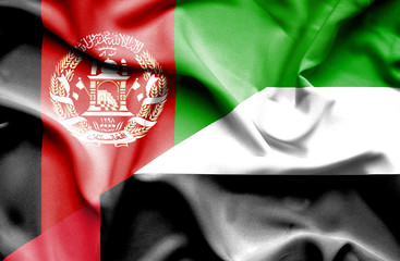 Waving flag of United Arab Emirates and Afghanistan