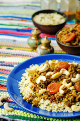 Spiced mince with dried apricots, cashew nuts and couscous