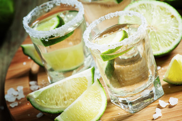 Silver Mexican tequila with lime and salt, selective focus