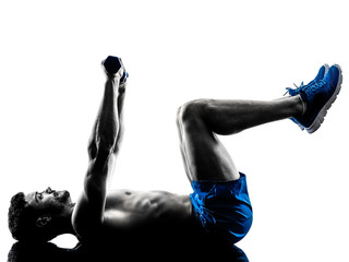 man exercising fitness crunches weights exercises silhouette