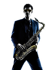 man saxophonist playing saxophone player  silhouette