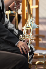 Fototapeta premium Trumpet in the hands of a musician 