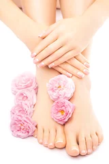 Foto op Canvas pedicure and manicure with a pink rose flower © Dmytro Titov