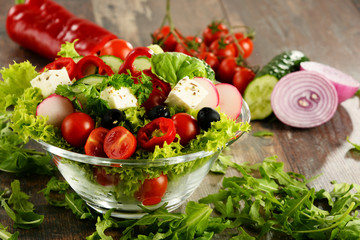 Vegetable salad bowl on kitchen table. Balanced diet