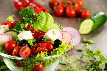 Vegetable salad bowl on kitchen table. Balanced diet