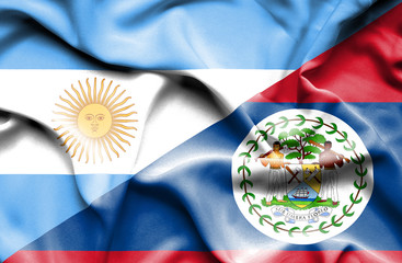 Waving flag of Belize and Argentina
