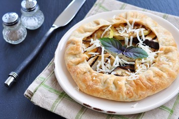 Galette pie with grilled vegetables and provolone cheese